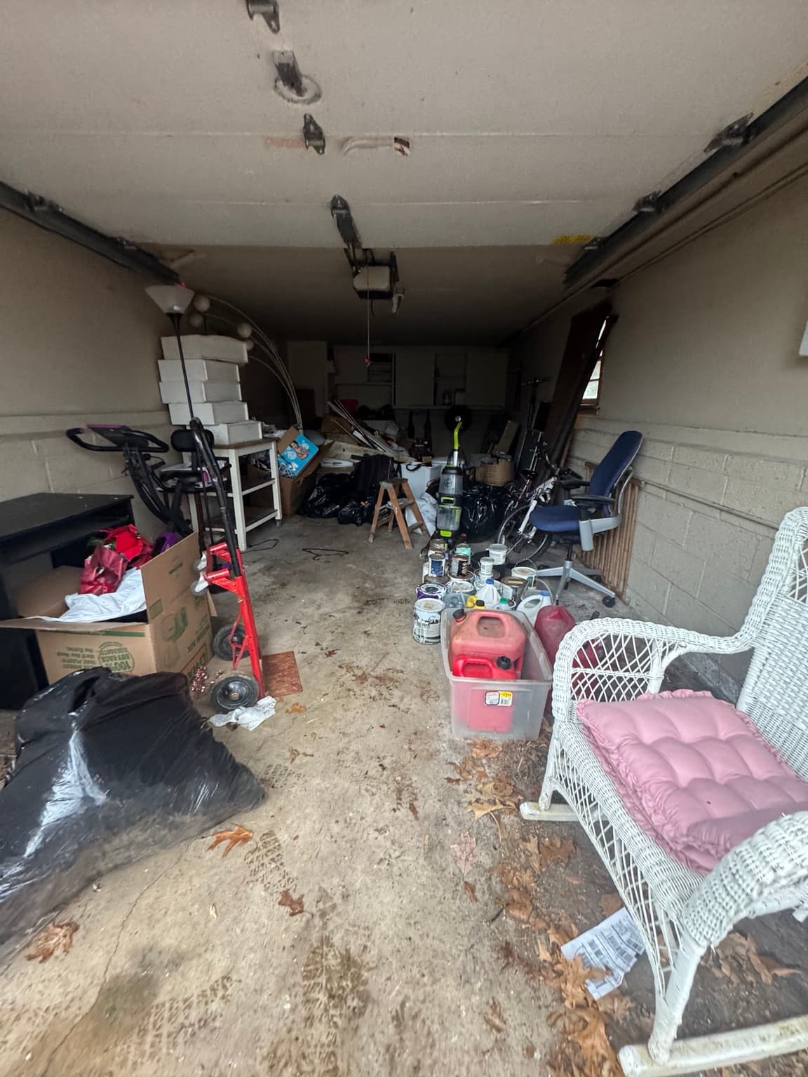 Cluttered garage before Junkfire cleanout