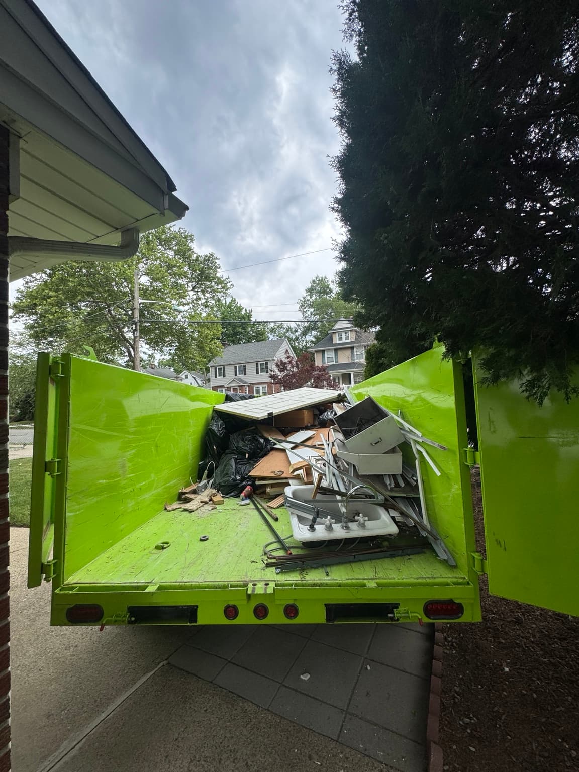 Junkfire trailer loaded with removed items